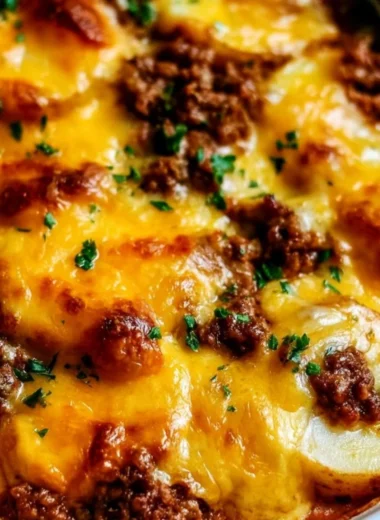 Hobo Casserole with Ground Beef and Potatoes in a baking dish