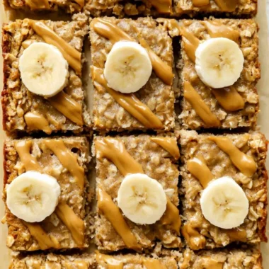 Delicious peanut butter baked oatmeal served in a bowl with toppings.